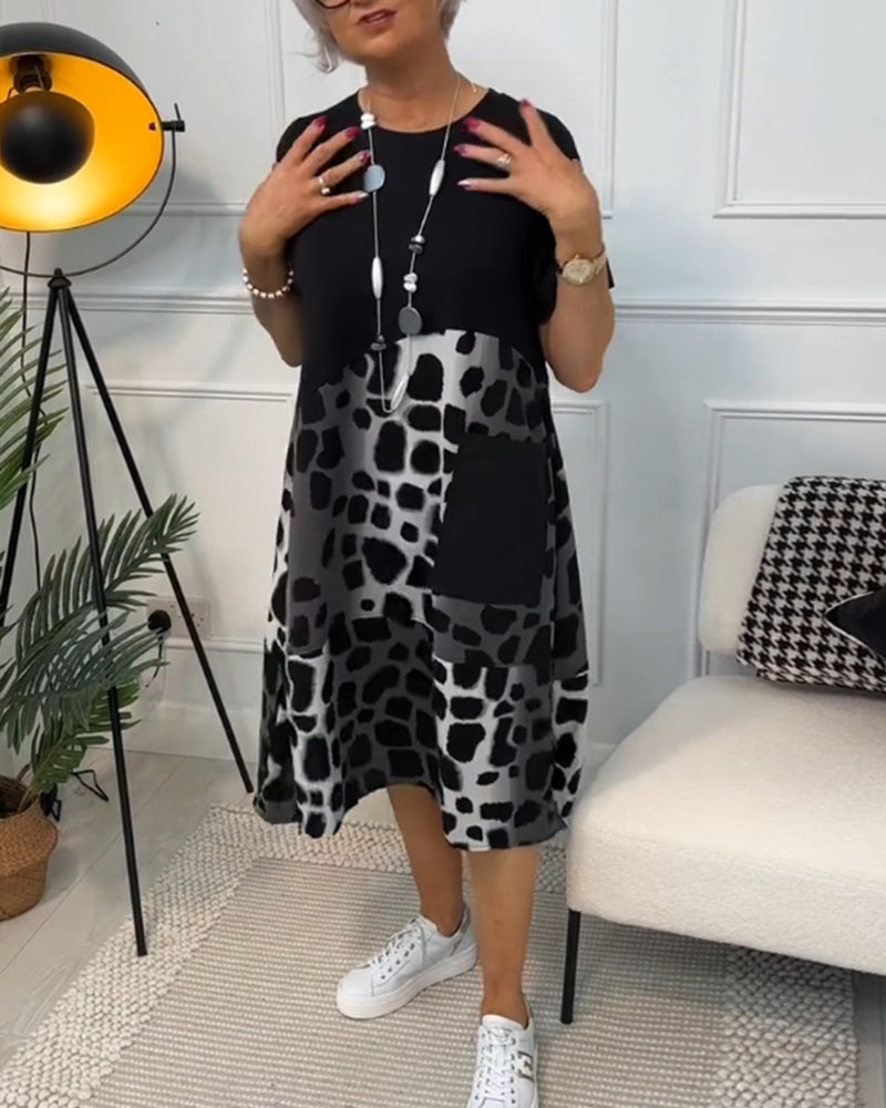 JO | Stylish short-sleeved midi dress with leopard print