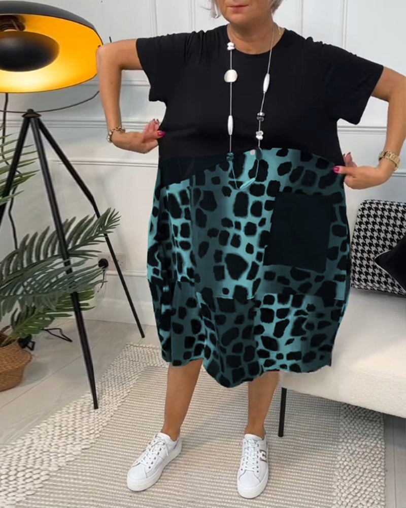 JO | Stylish short-sleeved midi dress with leopard print