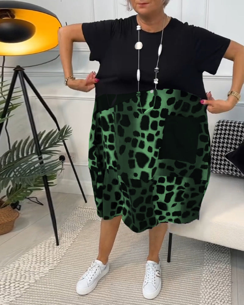 JO | Stylish short-sleeved midi dress with leopard print