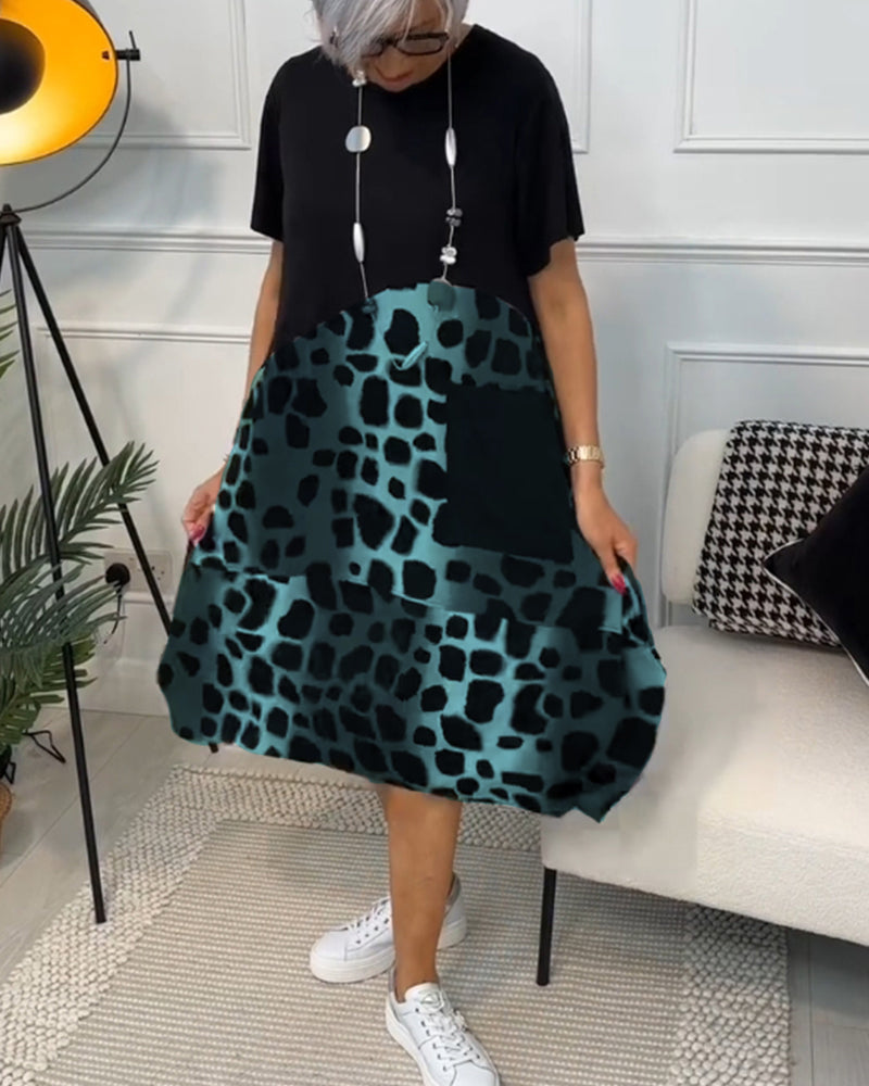 JO | Stylish short-sleeved midi dress with leopard print