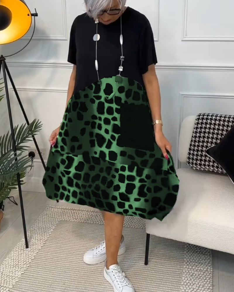 JO | Stylish short-sleeved midi dress with leopard print