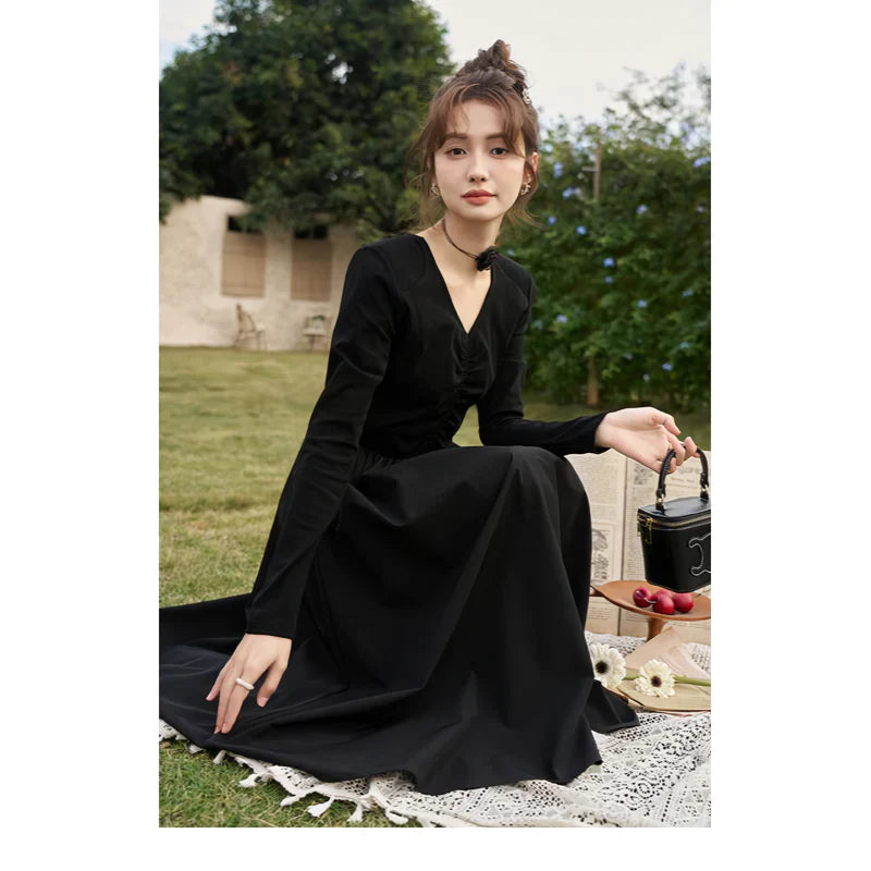 JO | Elegant Black Knitted Smocked V-Neck A-Line Midi Dress