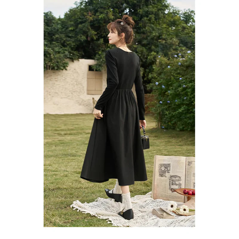 JO | Elegant Black Knitted Smocked V-Neck A-Line Midi Dress