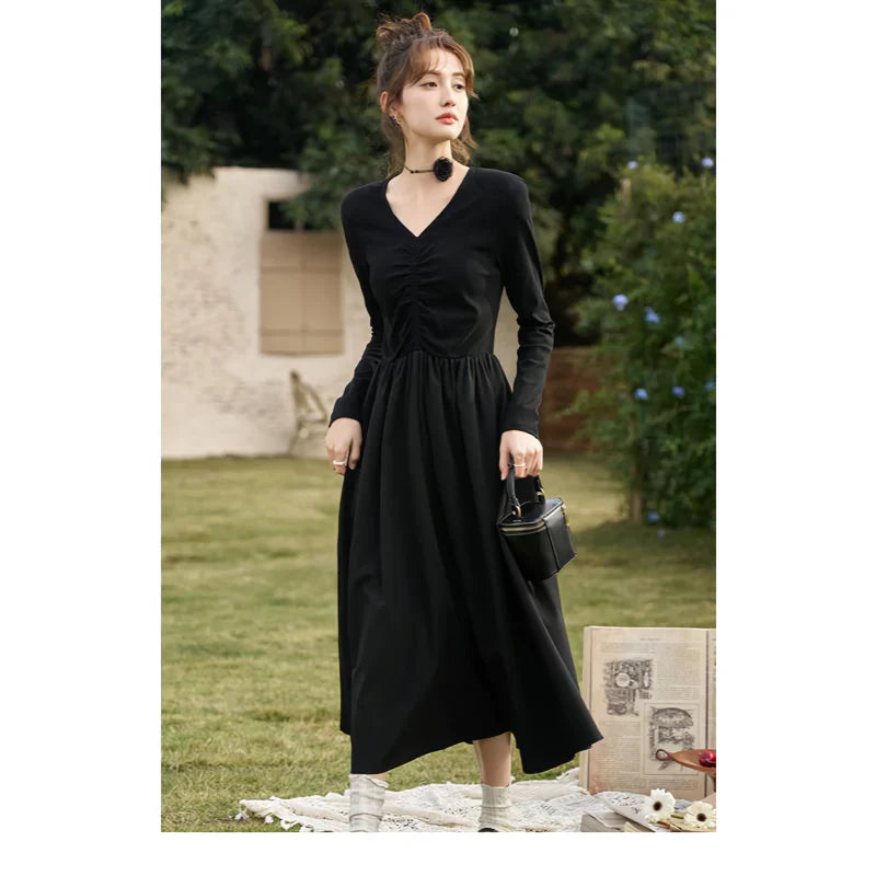 JO | Elegant Black Knitted Smocked V-Neck A-Line Midi Dress