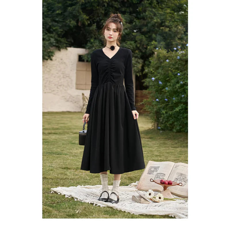 JO | Elegant Black Knitted Smocked V-Neck A-Line Midi Dress