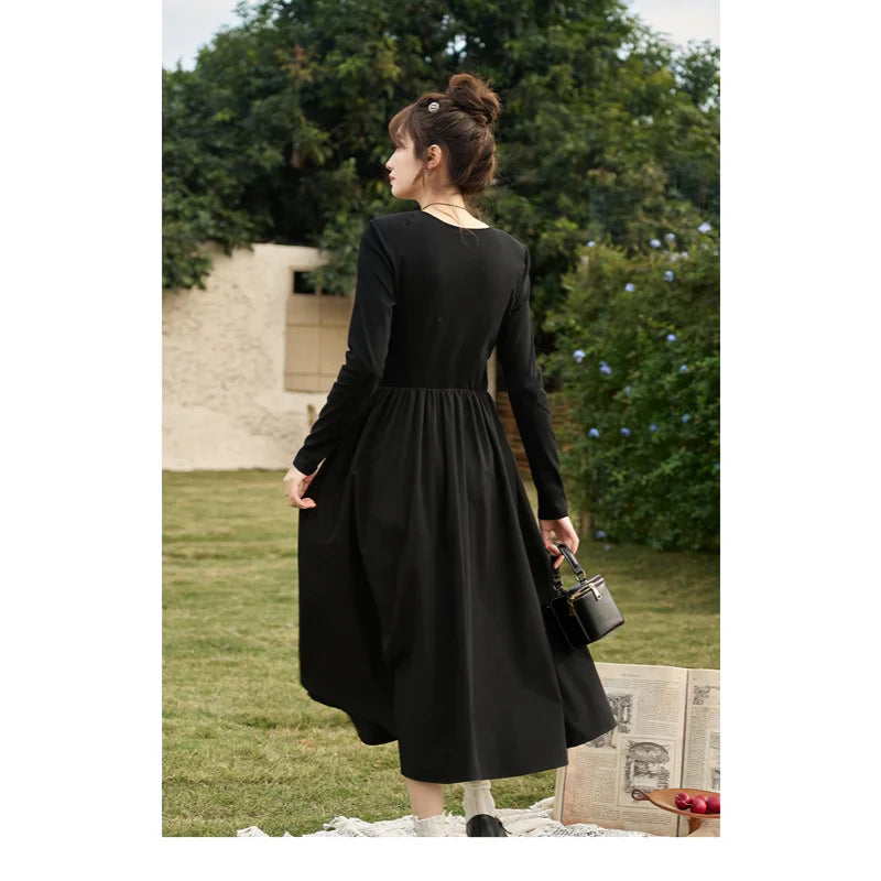 JO | Elegant Black Knitted Smocked V-Neck A-Line Midi Dress
