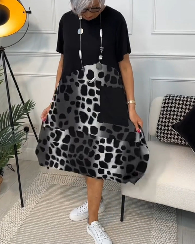 JO | Stylish short-sleeved midi dress with leopard print