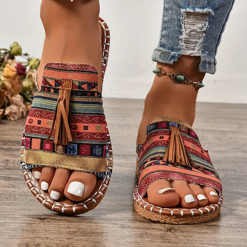 JO | | Flat sandals in ethnic style with pompom