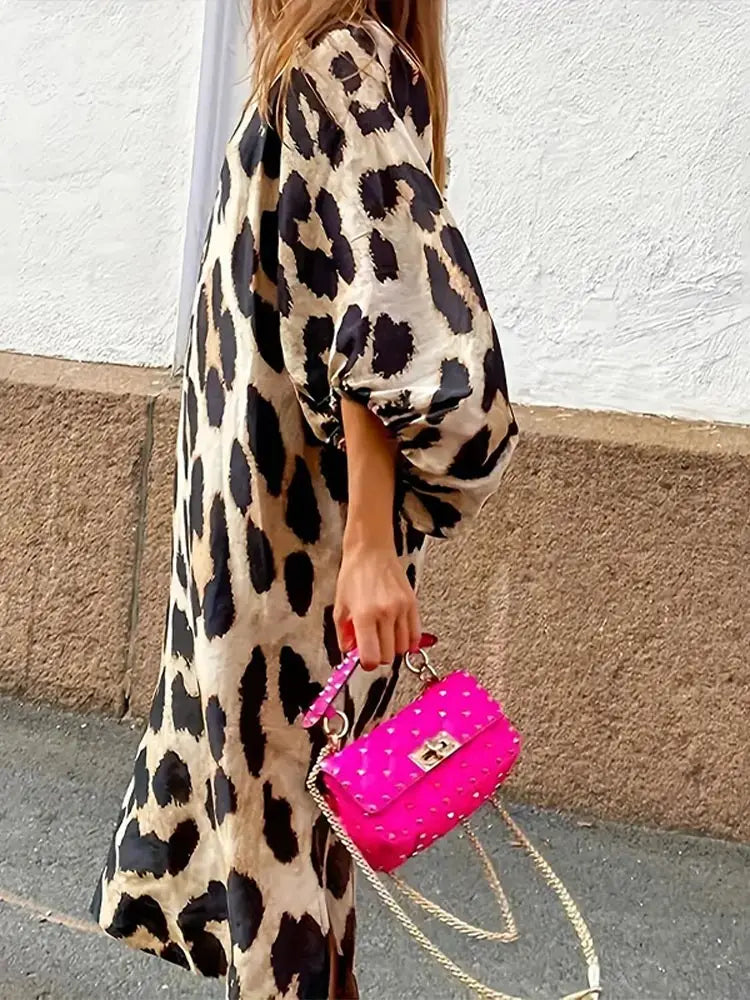 JO | Midi dress with leopard print and three-quarter sleeves