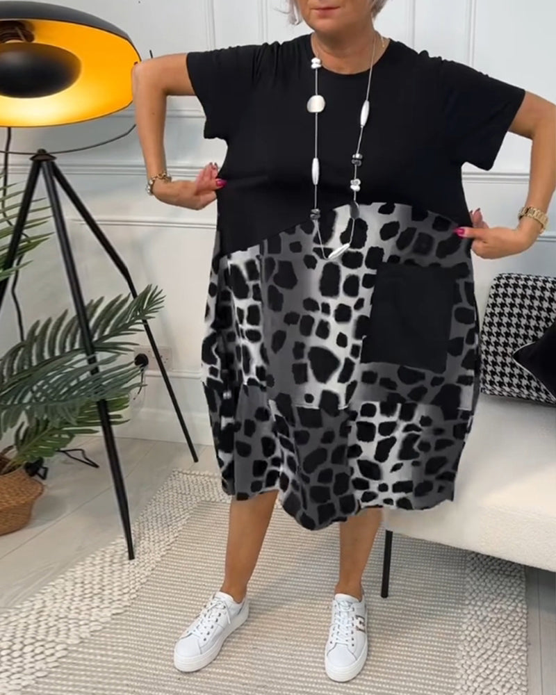 JO | Stylish short-sleeved midi dress with leopard print