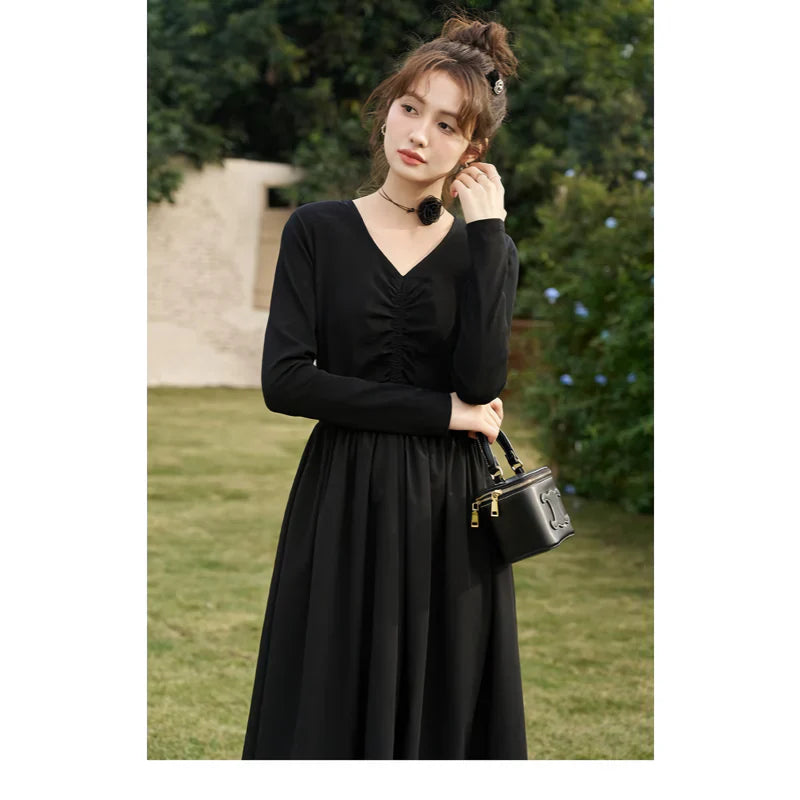 JO | Elegant Black Knitted Smocked V-Neck A-Line Midi Dress