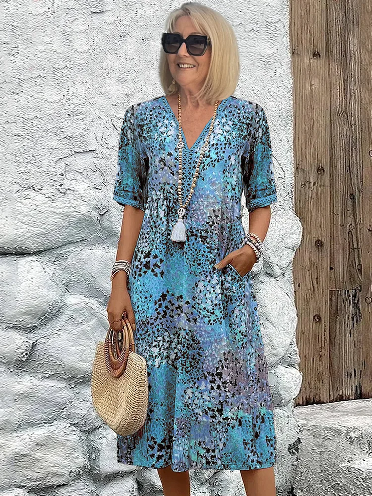 JO | Vibrant midi dress with pockets for women