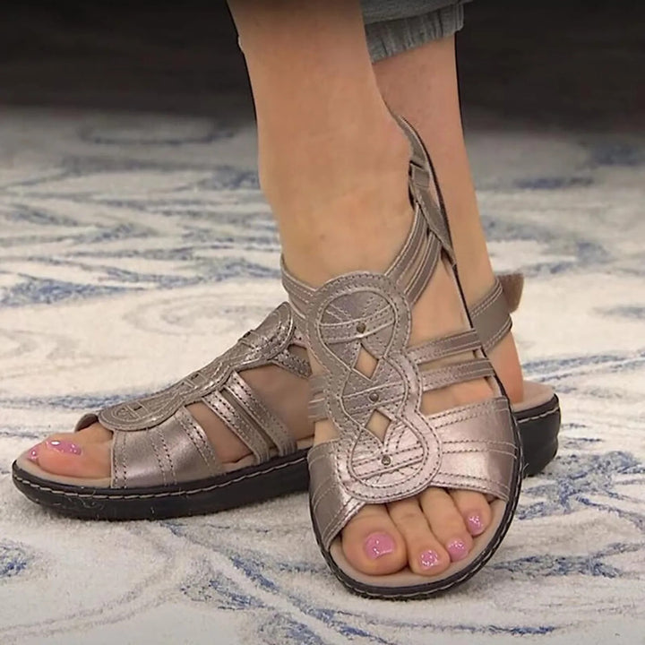 JO | | Ergonomic and elegant sandals with footbed