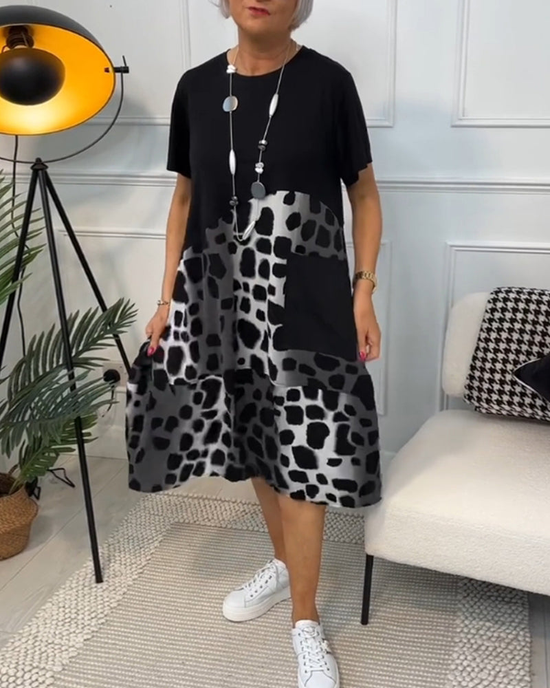 JO | Stylish short-sleeved midi dress with leopard print