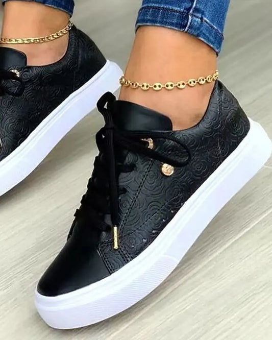 JO | Chic sneakers with golden details