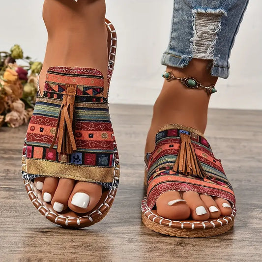 JO | | Flat sandals in ethnic style with pompom