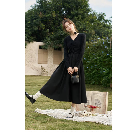 JO | Elegant Black Knitted Smocked V-Neck A-Line Midi Dress