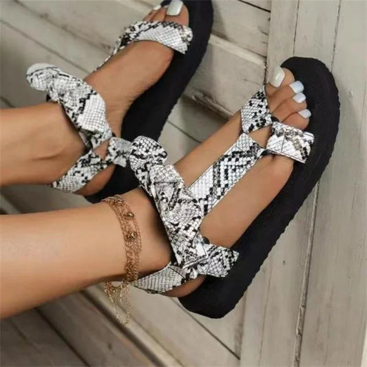 JO | | Flat summer sandals with leopard print