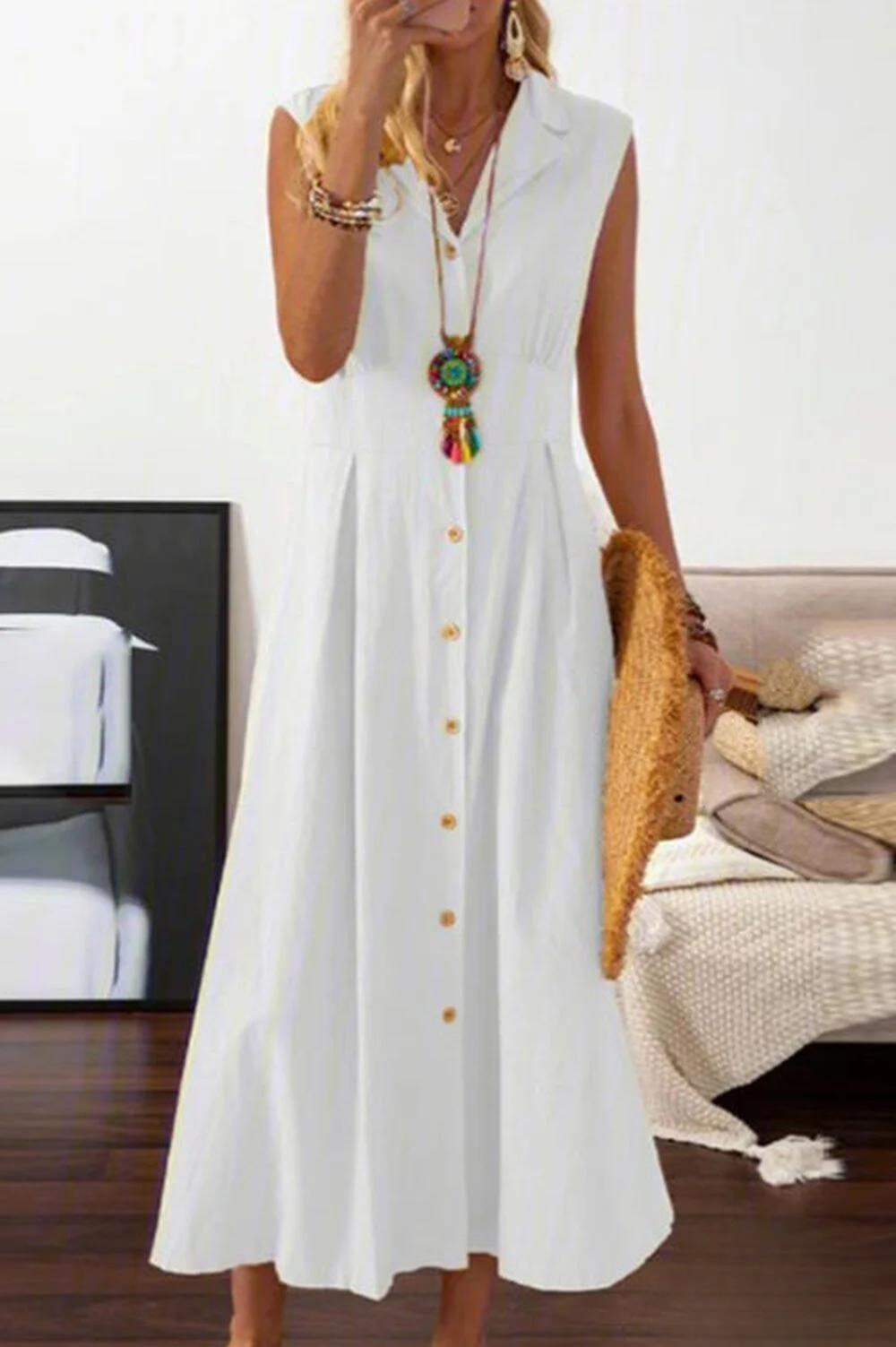 JO | sleeveless midi dress with overlapping buttons.