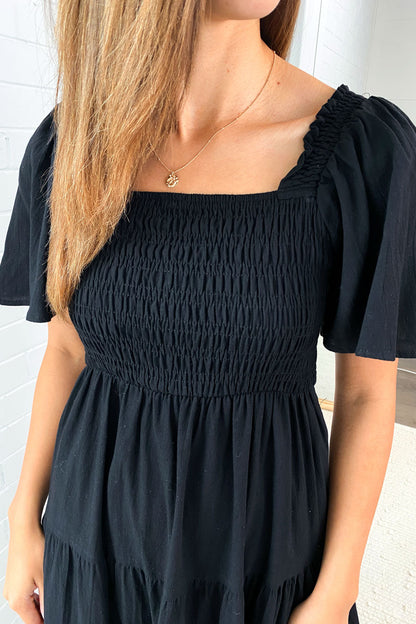 JO | Feminine off-shoulder midi dress