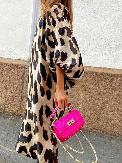 JO | Midi dress with leopard print and three-quarter sleeves