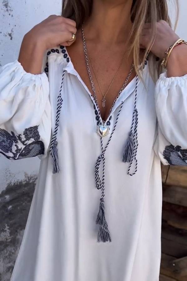 JO | Embroidered dress with V-neck and bell sleeves