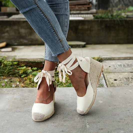 JO | - Platform sandals with bow straps